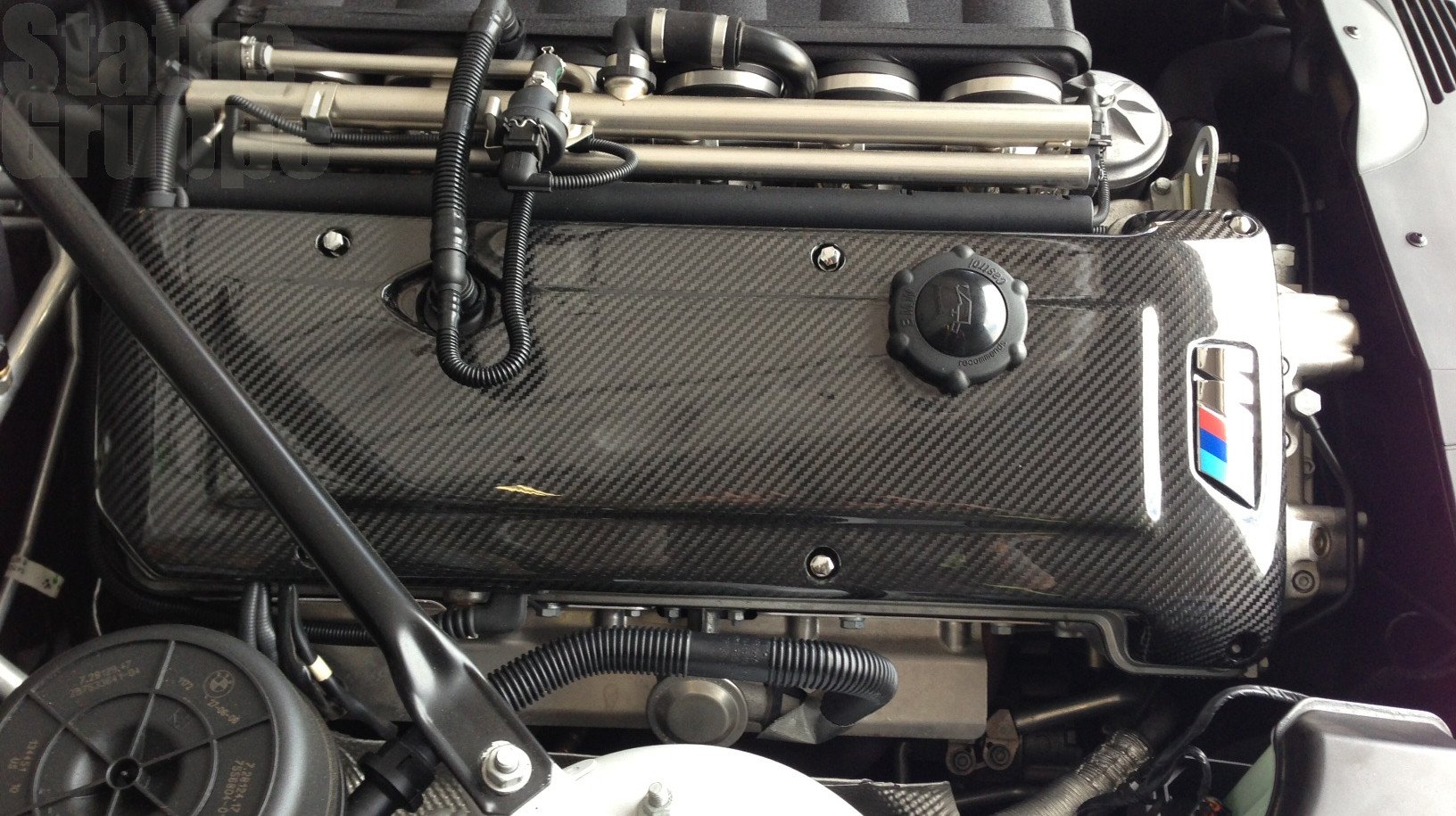// Our SGT Carbon fiber S54 Engine Cover is the perfect addition to any eng...